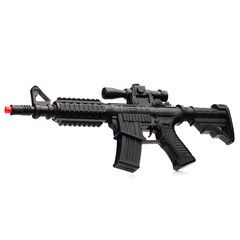Plastic children's black rifle on a white background.