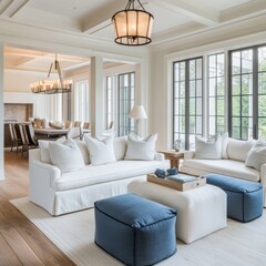 Elegant Living Room with Neutral Colors, Comfortable Seating, and Natural Light Flowing Through Large Windows
