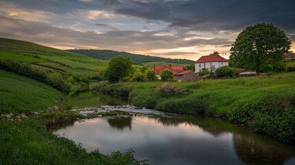 Obraz premium Picturesque riverside village at sunset, tranquil reflections