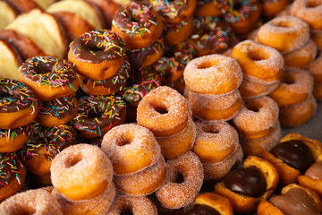 Market stall in Oaxaca with traditional sweets such as churros, donuts and meringues.