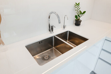Modern Kitchen Sink with Stainless Steel Double Basin and Minimalist Design in Contemporary Setting