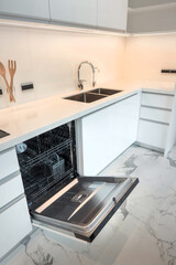 Modern Kitchen Interior with Sleek White Cabinets and Open Dishwasher on Marble Flooring