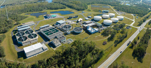 Aerial view of water treatment factory at city wastewater cleaning facility. Purification process...