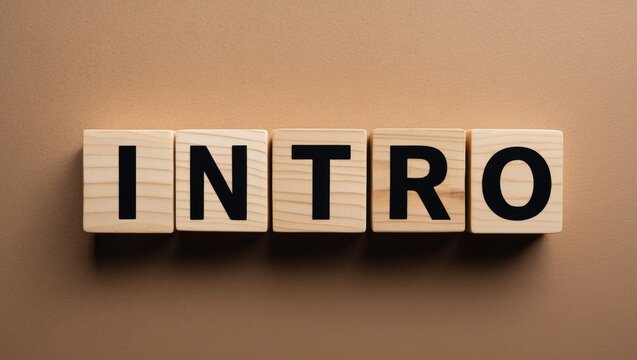 Alphabet letter blocks forming the word intro on a wooden background.