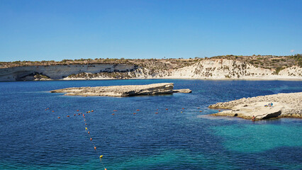 Malta coastline glimmers with azure sea. Malta environment merging rocky shores, Malta perspective...