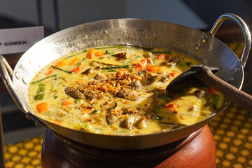 Traditional Indonesian dish, captured on March 12, 2025. A flavorful combination of rich spices and fresh ingredients, showcasing Indonesia’s authentic culinary heritage