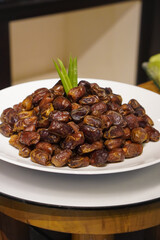 Fresh dates, captured on March 12, 2025. Naturally sweet and chewy, perfect for a nutritious snack or a traditional Ramadan treat