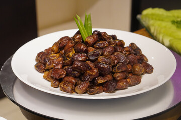 Fresh dates, captured on March 12, 2025. Naturally sweet and chewy, perfect for a nutritious snack or a traditional Ramadan treat