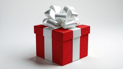 Red gift box with white ribbon and bow set against a white background.