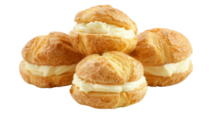 Cream puffs forming a small pyramid on transparent background