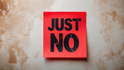 Red note on a textured background displays the text JUST SAY NO, encouraging individuals to learn to refuse without the fear of rejection, feeling trapped, resentful, or guilty. Be more assertive a...