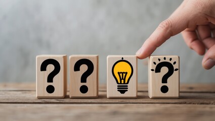 Question marks and a light bulb representing an idea or solution. Skills for problem solving, creativity, innovation, brainstorming, critical thinking, and root cause analysis concept. Questions, i...