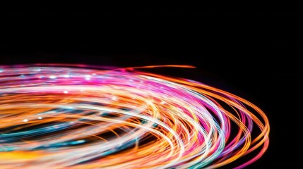 Swirling colorful light trails in motion