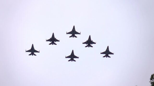 Six Fighter Jets Flying in Formation Against a Blue Sky in slow motion 120fps