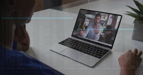 Person watching video call on laptop with data processing animation overlay - Powered by Adobe