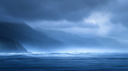 Obraz premium Dark clouds loom overhead as gentle waves crash against a dramatic shoreline. The mystic blues and cool tones create an enchanting atmosphere during twilight hours