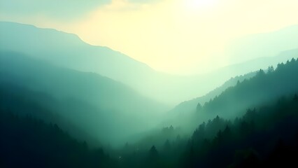 Naklejka premium Nature's Calm: Misty Peaks and Soft Light at Sunrise