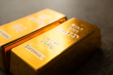gold bars on a wooden table
