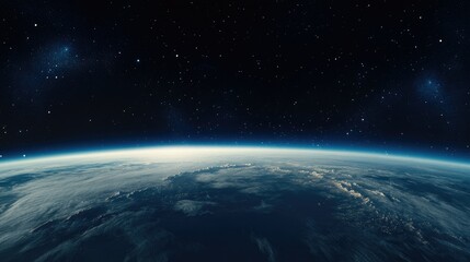 View of Earth from space at dawn with a dark sky filled with stars and a bright blue horizon creating a peaceful yet awe-inspiring atmosphere