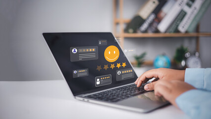 Satisfaction survey, Customers use laptop to rate their experience with five stars, Service quality...