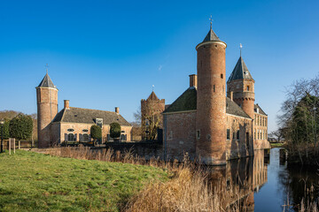 Fototapeta premium Domburg, Province Zeeland, Netherlands – March 03, 2025 - Westhove Castle, located in the nature reserve de Manteling near Domburg