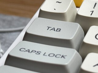 The tab macro button on a mechanical keyboard that is responsible for launching various functions