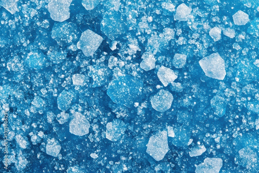 Poster Close-up view of snow and ice crystals creating intricate patterns on a frozen lake, providing an abstract winter background with vibrant blue colors