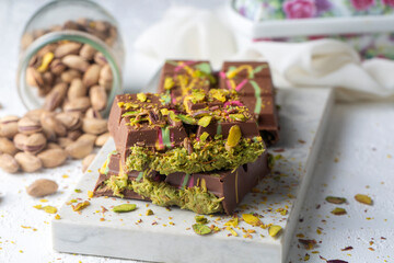 New trend chocolate; Chocolate with pistachio paste and kadayif; Dubai chocolate.