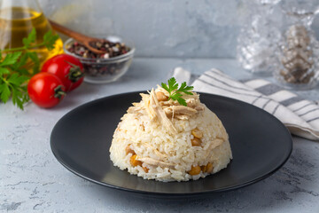 Traditional delicious Turkish food; Rice with chickpeas and chicken (Turkish name; Tavuklu nohutlu pilav or pilaf)