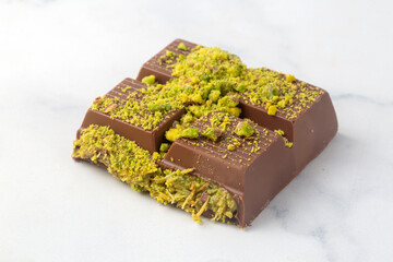 New trend chocolate; Chocolate with pistachio paste and kadayif; Dubai chocolate.