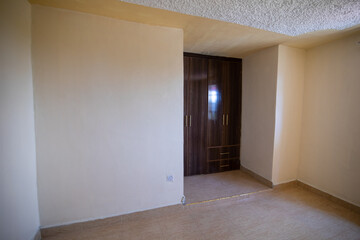 empty room with door and window