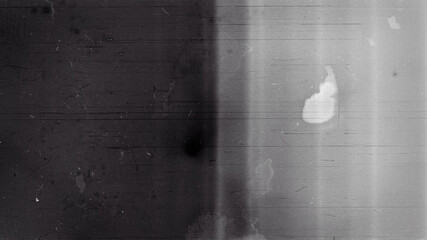 Blank grained film strip texture background with heavy grain, dust and light leak