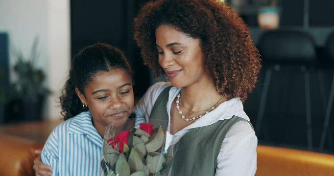 Woman, girl and flowers with hug for mothers day on sofa with care, love and gratitude for surprise. African people, mother and daughter with embrace, bouquet and roses with present in family house