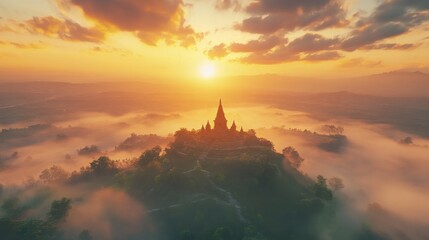 Fototapeta premium Pagoda on Misty Hilltop with Rising Sun Behind