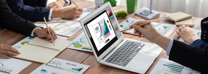 Graphic designer software for modern design of web page and commercial brisk ads showing on the...
