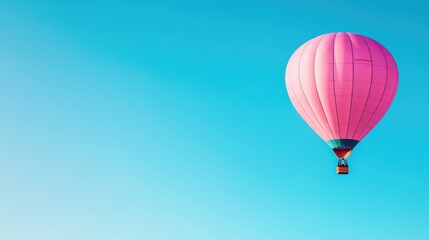 Obraz premium vibrant hot air balloon ascends against clear blue sky with ample copy space enveloping expansive scene inviting thoughts