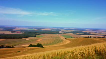 Fototapeta premium Rolling Hills and Farmland Under a Blue Sky