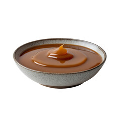 Thick caramel sauce in a ceramic dish, isolated on transparent background.