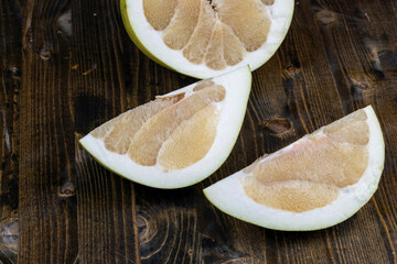 ripe pomelo with lots of pulp cut into pieces