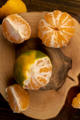 peeled orange ripe tangerines on the table
