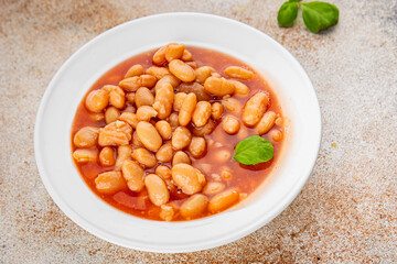 White bean tomato sauce delicious gourmet food background on the table rustic food top view copy space keto and paleo diet vegetarian and vegan food