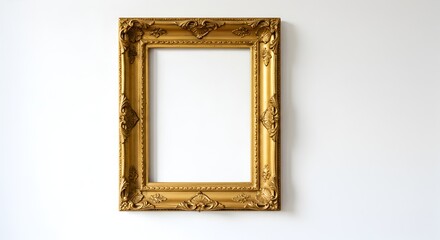 Elegant gold ornate frame on white wall, perfect for artwork display