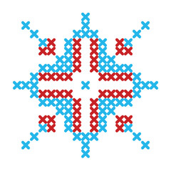 Colorful cross stitch pattern snowflake with red and blue geometric design on a white background