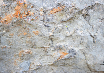 Dark gray stone with textures. Closeup. For design. Grunge gray banner
