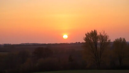 Serene sunset landscape with golden light illuminating autumn trees
