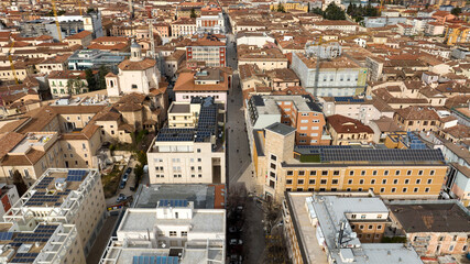 Fototapeta premium Aerial view of Vittorio Emanuele Street in the historic center of L'Aquila, Abruzzo, Italy. It is a pedestrian road and the most important street of the city.