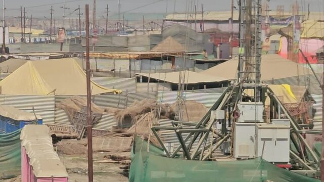 View Tent City Prayagraj, Uttar Pradesh, India. Maha Kumbh Mela 2025 in Prayagraj. The Kumbh Mela is a significant Hindu pilgrimage that symbolises the world's largest human assembly.