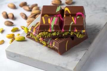 Dubai chocolate, milk chocolate filled with pistachio paste and kunefe