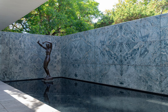 Alba statue by Georg Kolbe and reflection pool at Mies van der Rohe's Barcelona Pavilion, Barcelona, Spain