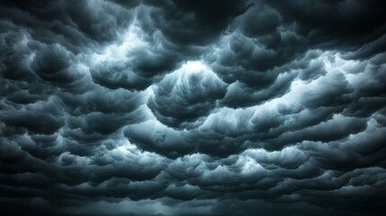 A striking scene of dark storm clouds lit up by lightning flashes, evoking a powerful and intense mood